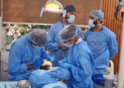 Dr-Jaydev-Dental-Team-doing-surgery
