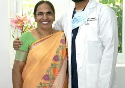 Dr-Jaydev-with-a-patient-smile-makeover