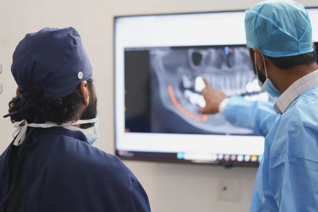 Dr-Jaydev-team-analysing-patient-background